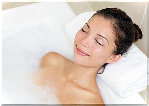 woman in tub to get rid of headaches