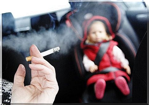 Irresponsible parent who smokes in front of his baby