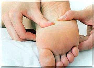 Person receiving foot massage