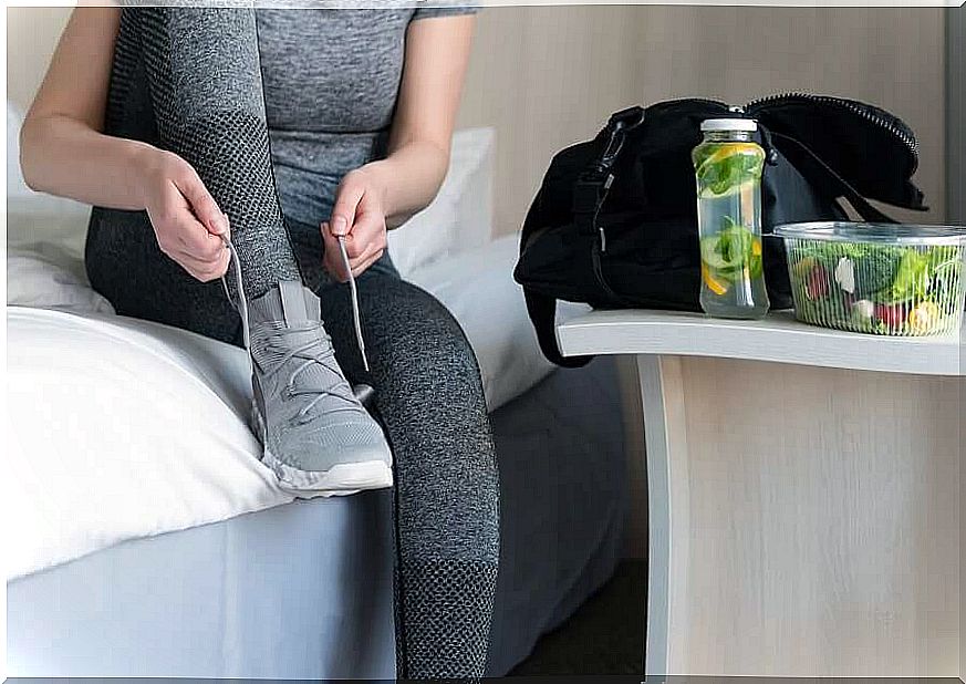 A woman gets ready to train