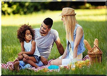 An upset girl with her parents.