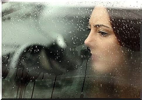 woman looks out of the dew window and can move on