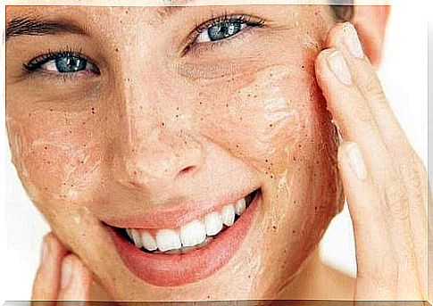 Woman washes her face to get clean and soft skin