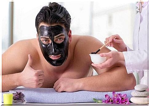 Man with black face mask