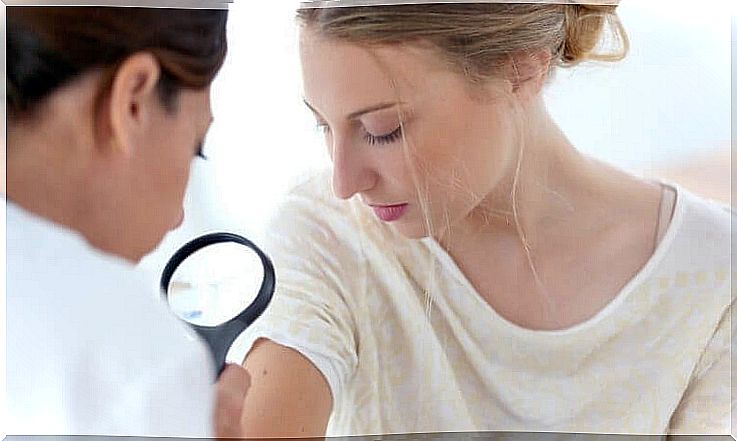 Woman being checked by her doctor.