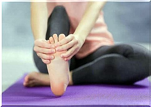 Woman doing stretching exercises to reduce swollen feet and ankles 