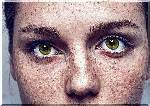 Close-up of woman with freckles